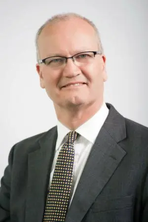 Cllr Matthew Hicks dark grey jacket, white shirt and tie