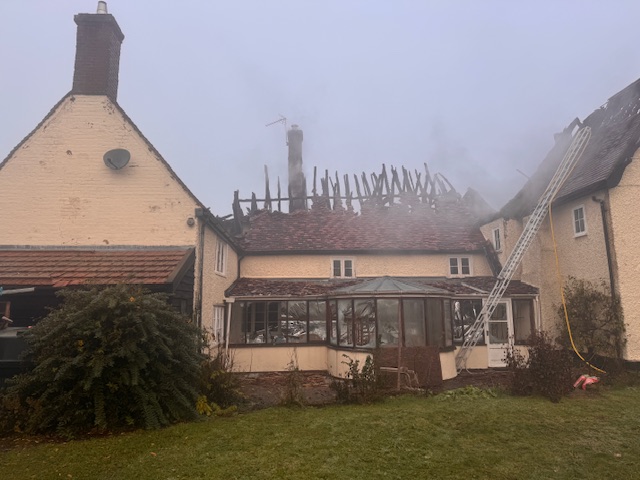 The aftermath as seen from the rear of the property. 
