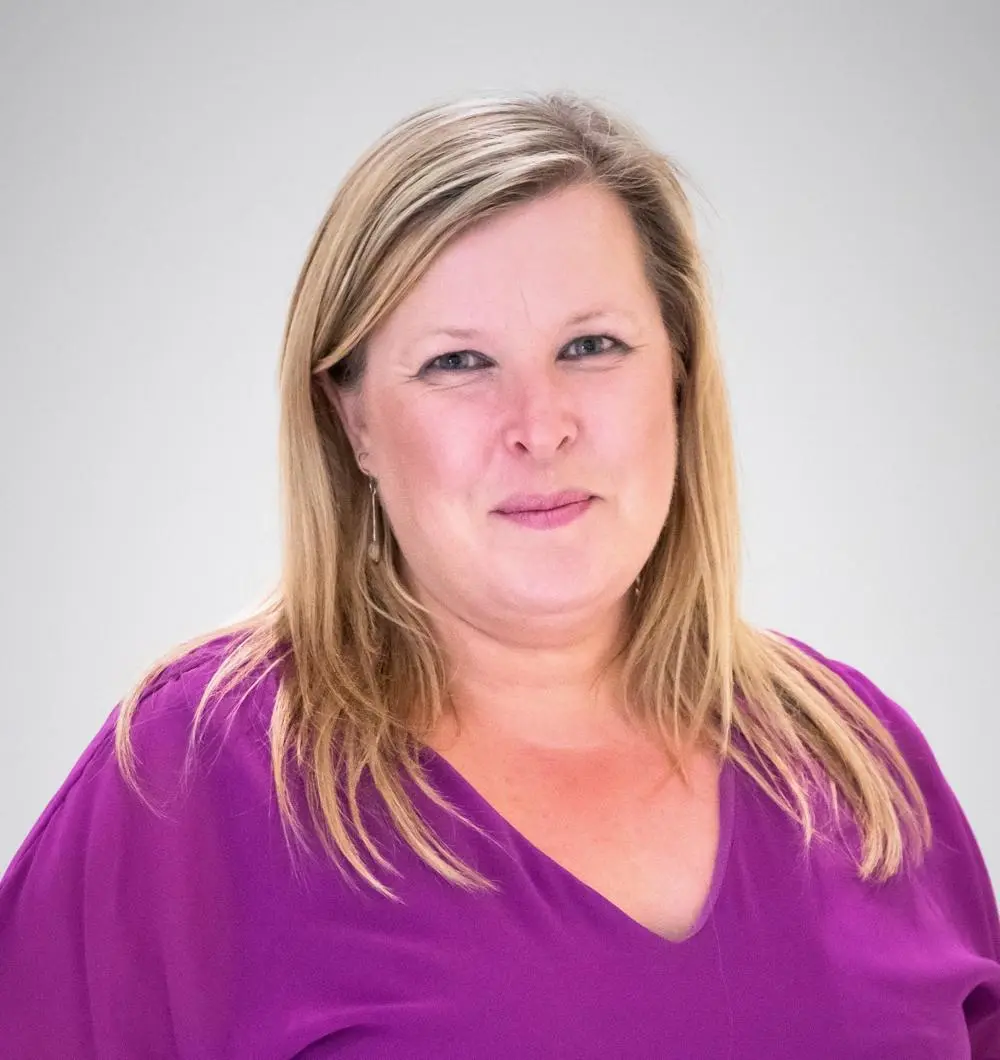 Lucy Humphrey - Managing Director of Leading Lives, wearing a purple top