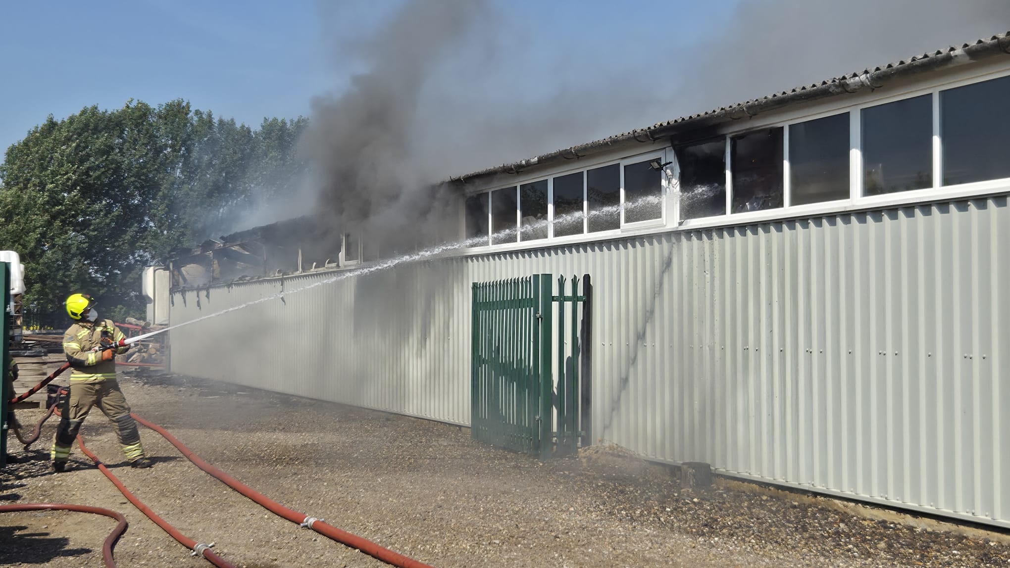 Firefighter tackling the blaze 
