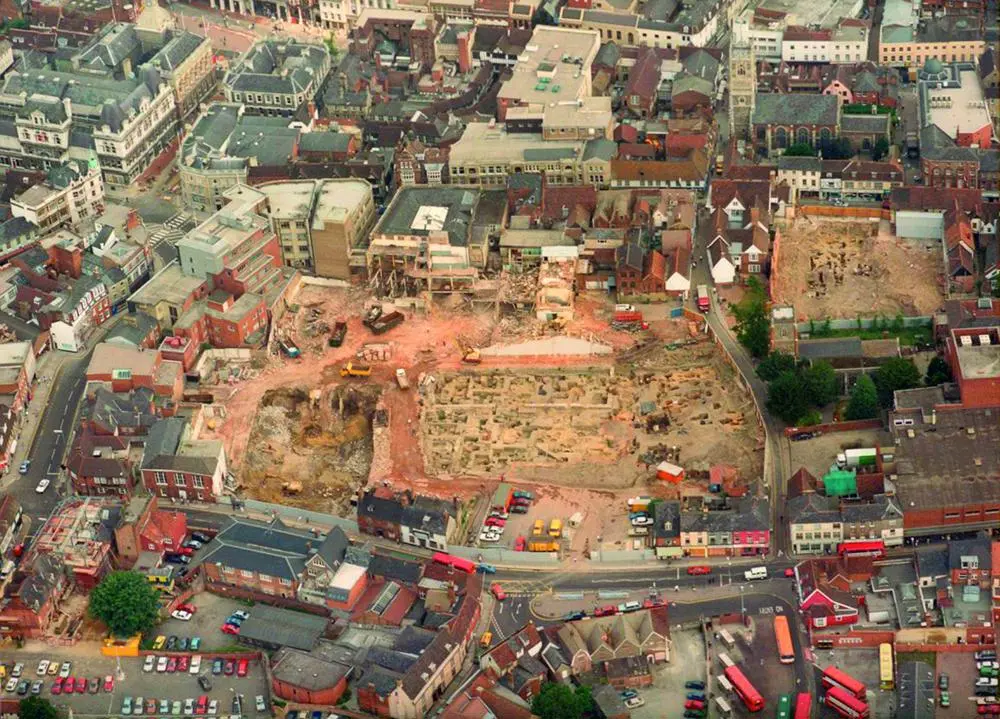 An aerial view of the Buttermarket excavation showing streets and buildings
