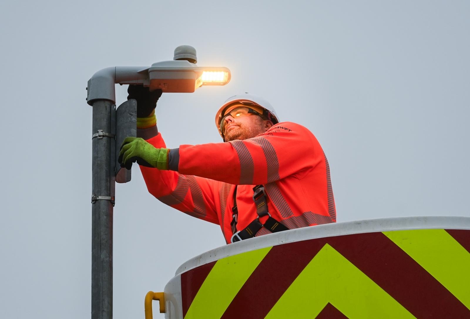Streetlighting teams repairing faults