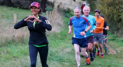 Five people running on a path around Alton Water