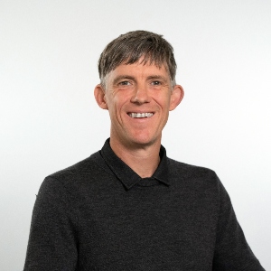 Councillor Ash Lever wearing black jumper and shirt 