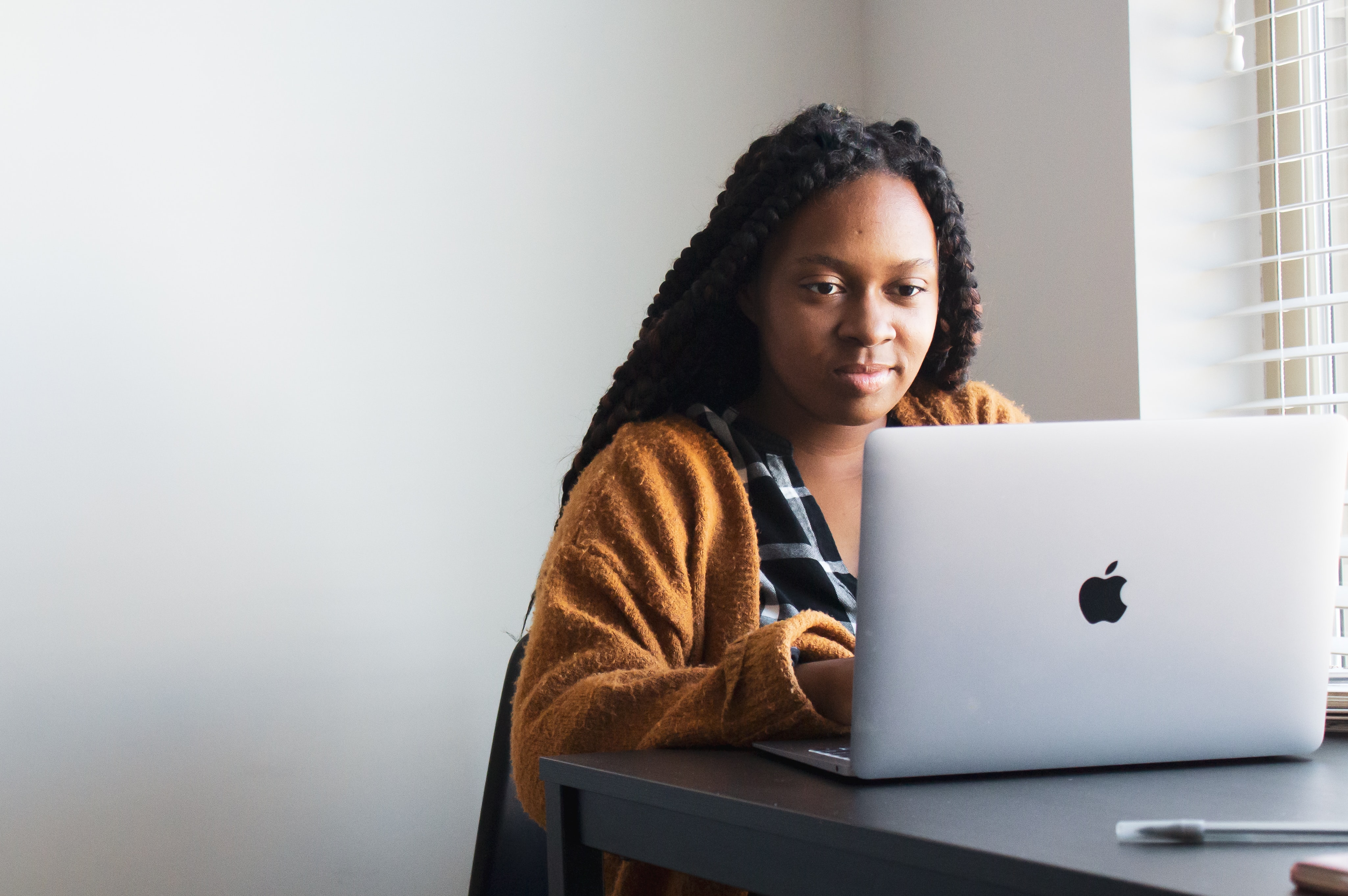 Black woman using laptop