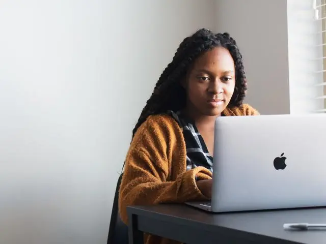 Black woman using laptop