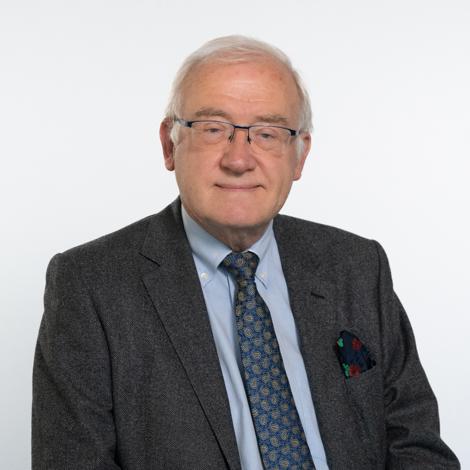 Councillor Christopher Hudson wearing suit and tie