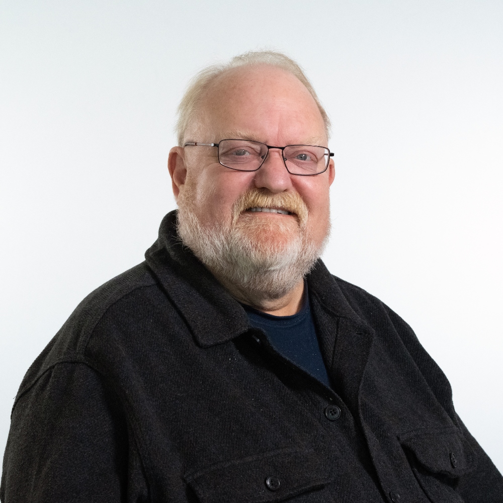 Councillor Colin Kreidewolf wearing black jacket and dark shirt