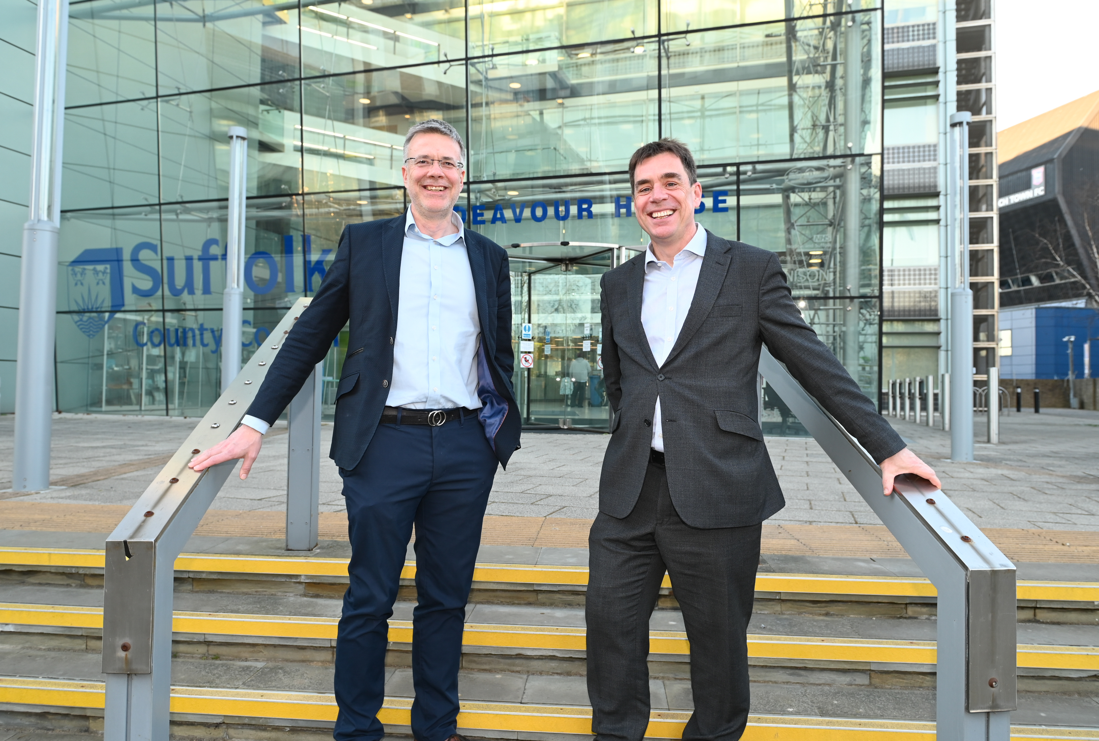 Councillor Paul West, Suffolk County Council's cabinet member for Ipswich, operational highways and flooding stands with Matthew Riches, Operations Director for Milestone outside Endeavour House in Ipswich