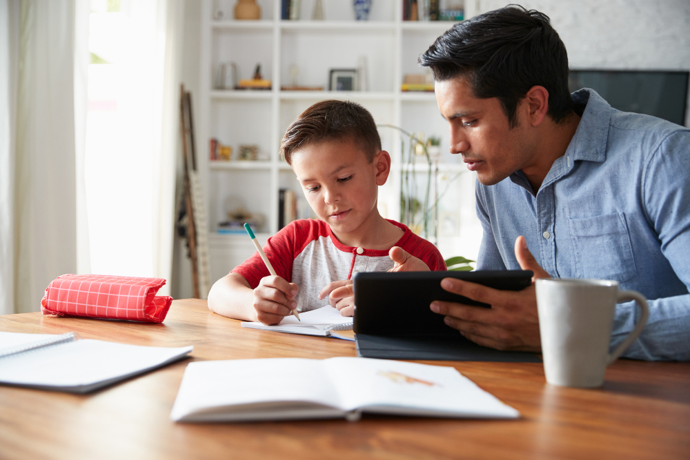 Father and son learning at home