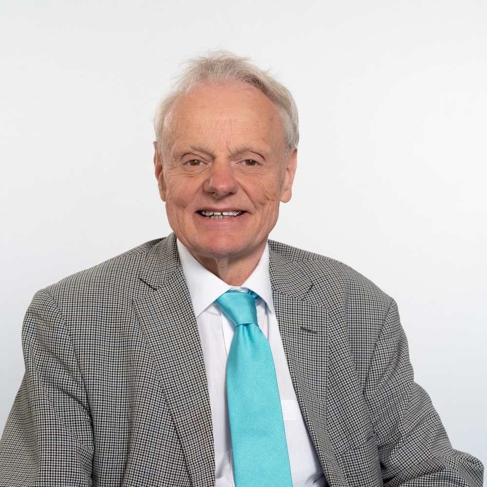 Cllr David Hurlbut wearing jacket and light blue tie