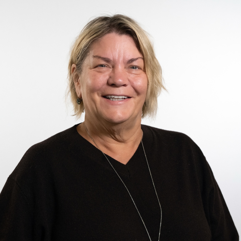 Cllr Debbie McCallum wearing black jumper with silver necklace