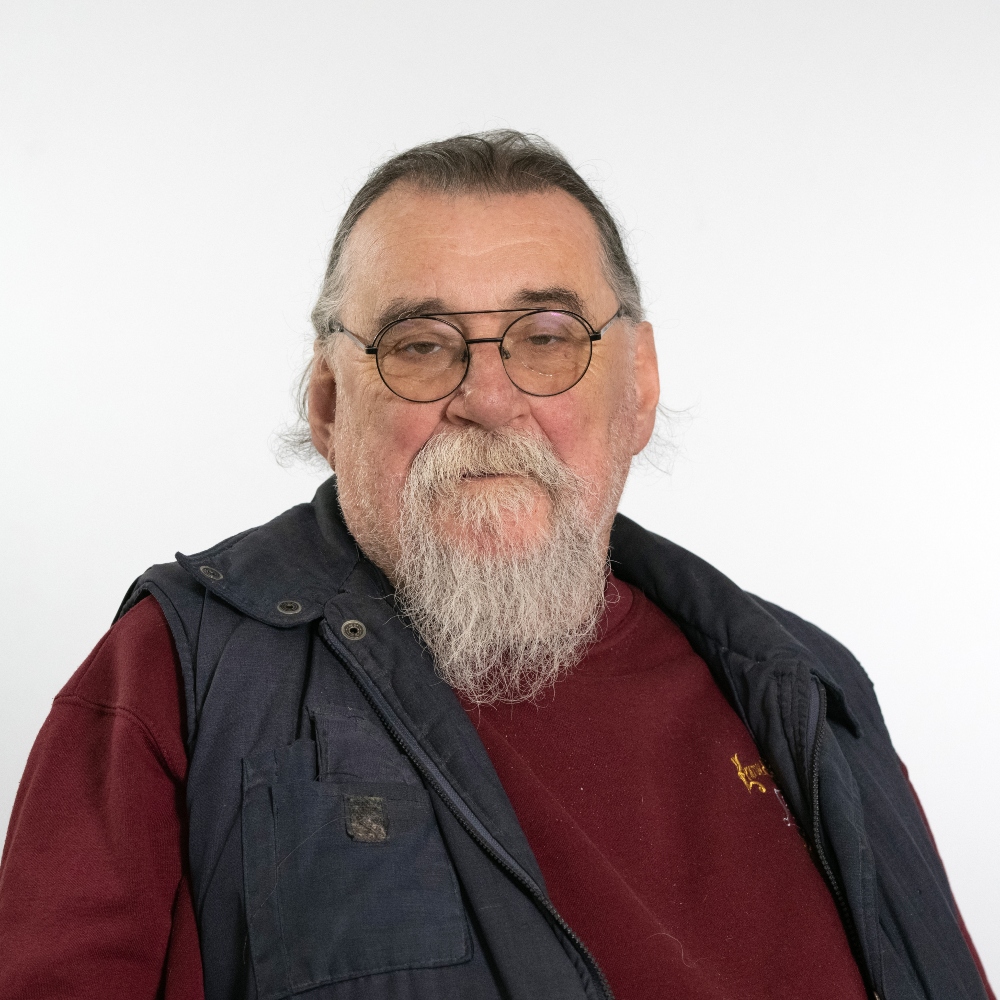 Councillor Don Waldron wearing black gilet and red jumper