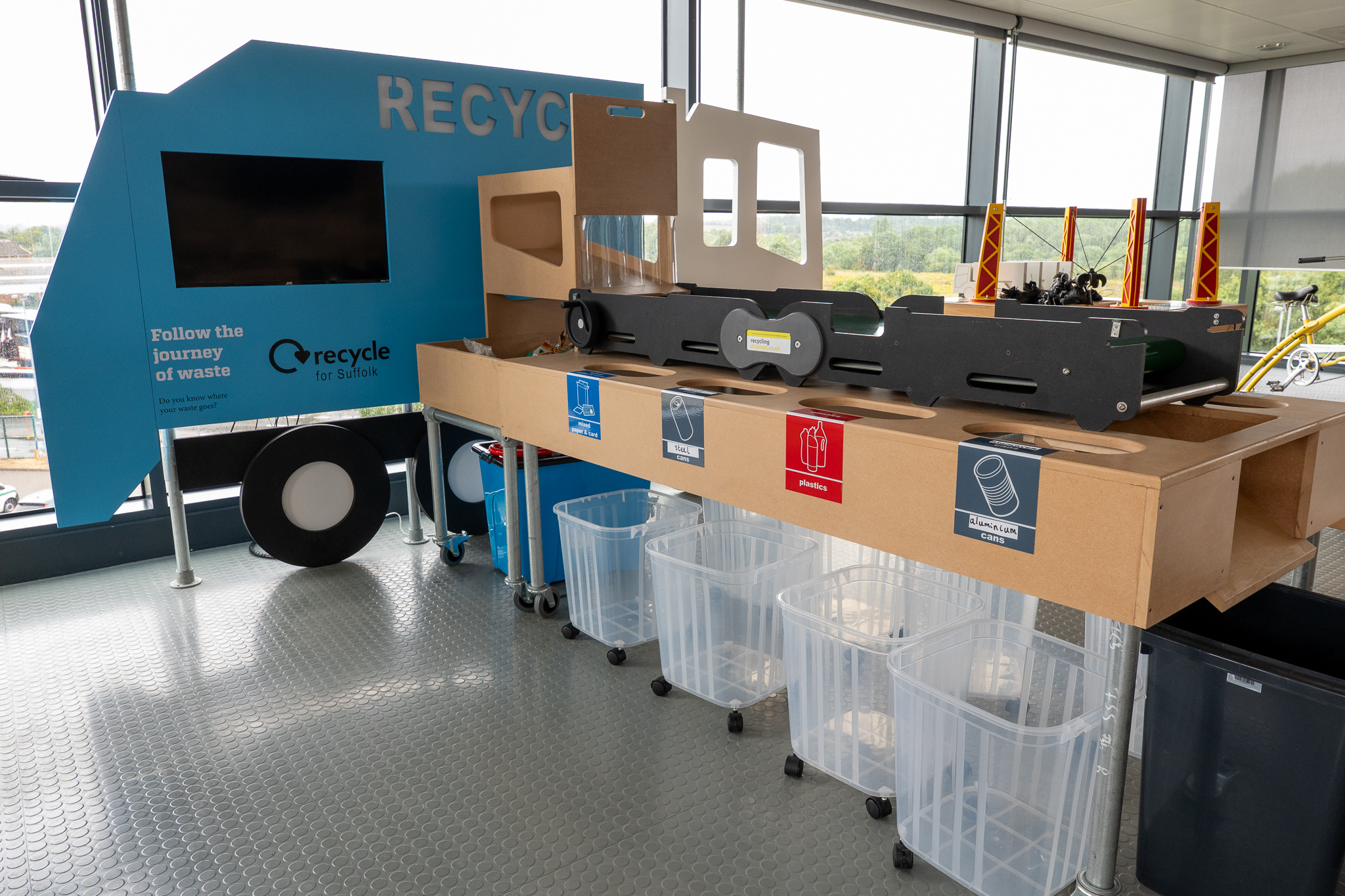 an activity station showing recycling at the visitor centre