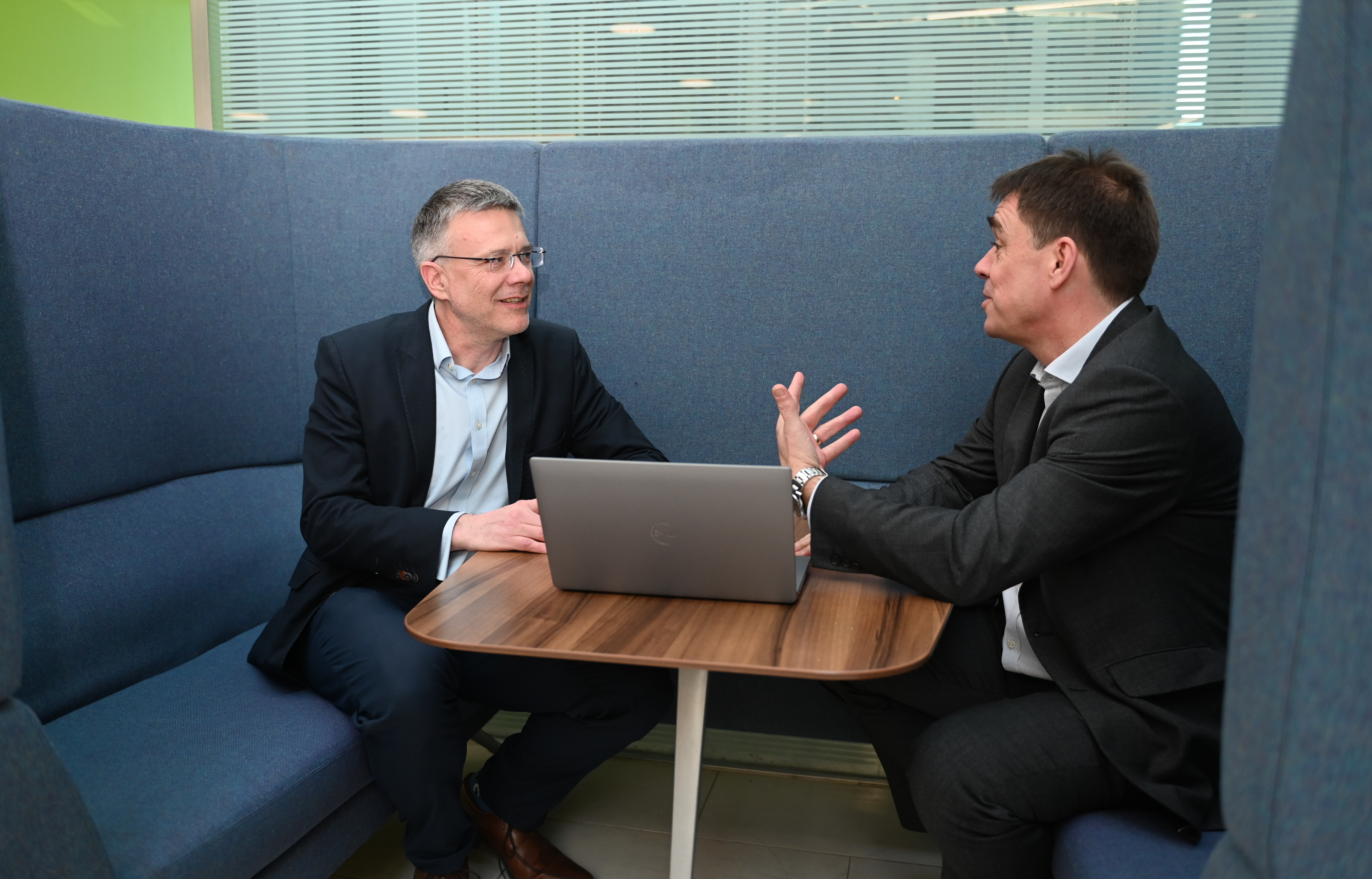 Matthew Riches, Operations Director for Milestone (right) talks to Councillor Paul West (left) about the future of highway services in Suffolk 