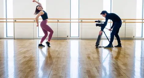Dancer being filmed in a dance studio