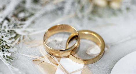 Gold rings on white background