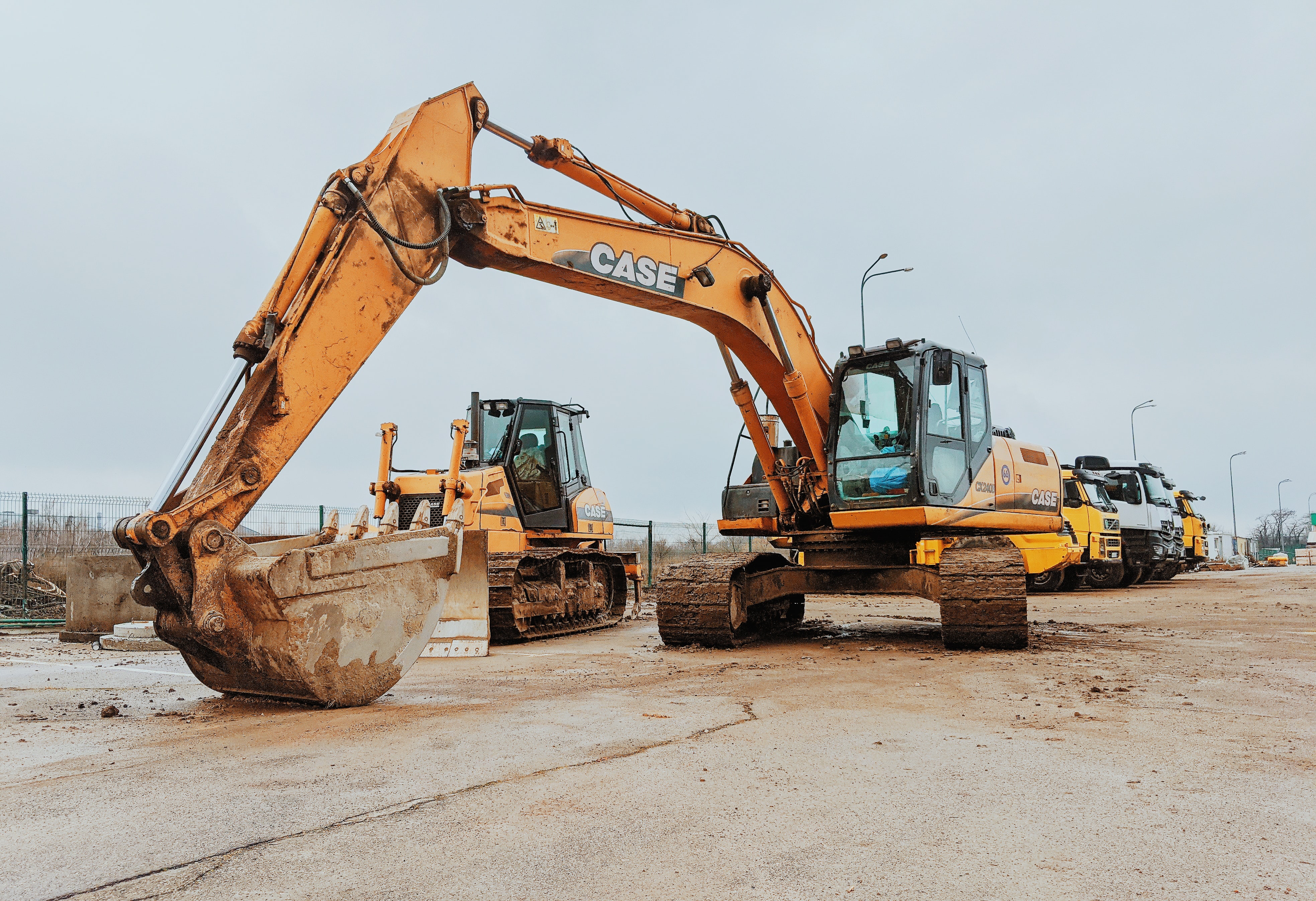 Heavy machinery and lorries in a construction yard