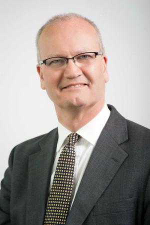 Cllr Matthew Hicks dark grey jacket, white shirt and tie
