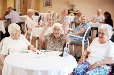 Older women enjoying a social game