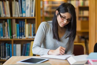 Woman studying in library