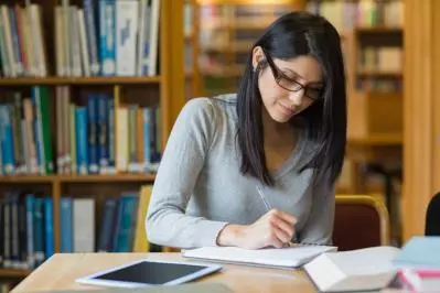 Woman studying in library