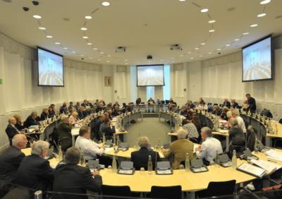 Full group of councillors sitting in the Council Chamber