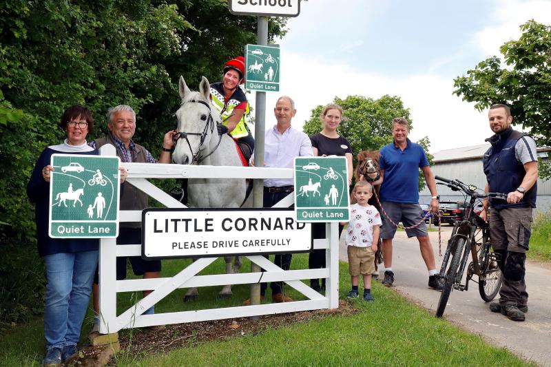 People standing outside Little Cornard Quiet Lane
