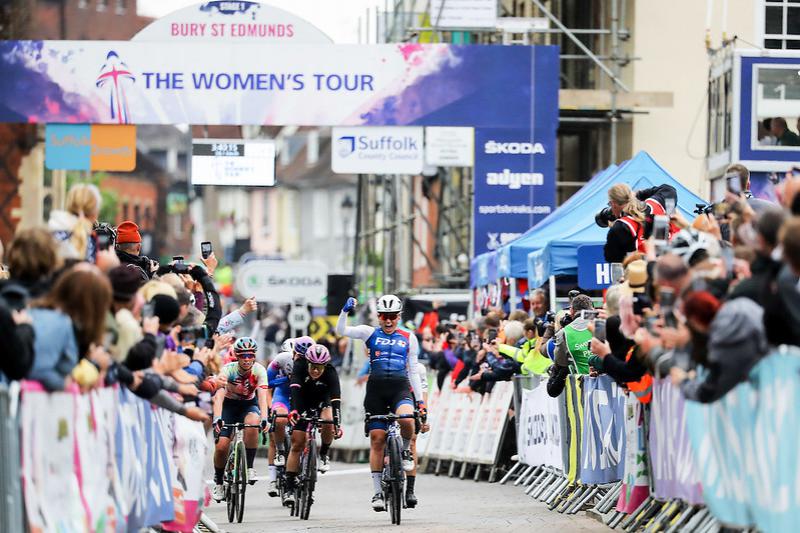 Cyclists crossing a finish line