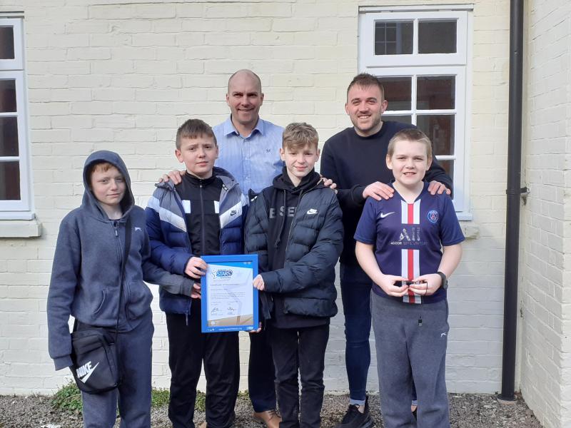 Wetheringsett pupils celebrate their award.