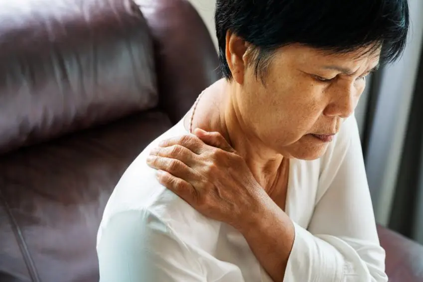 Older woman with neck and shoulder pain