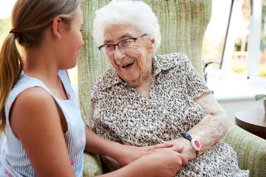 Woman in care home with granddaughter