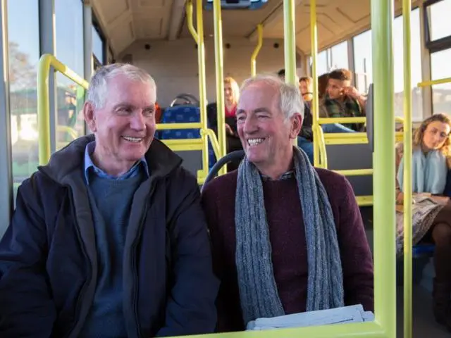 Two men on a bus