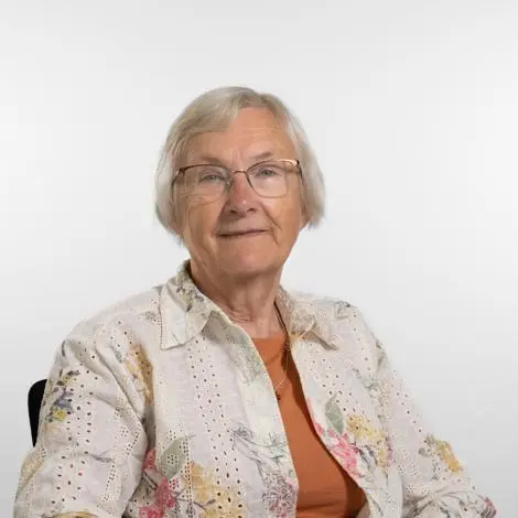 Councillor Inga Lockington wearing floral top and orange t-shirt