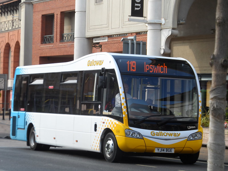 A bus is parked and waiting for passengers to board 