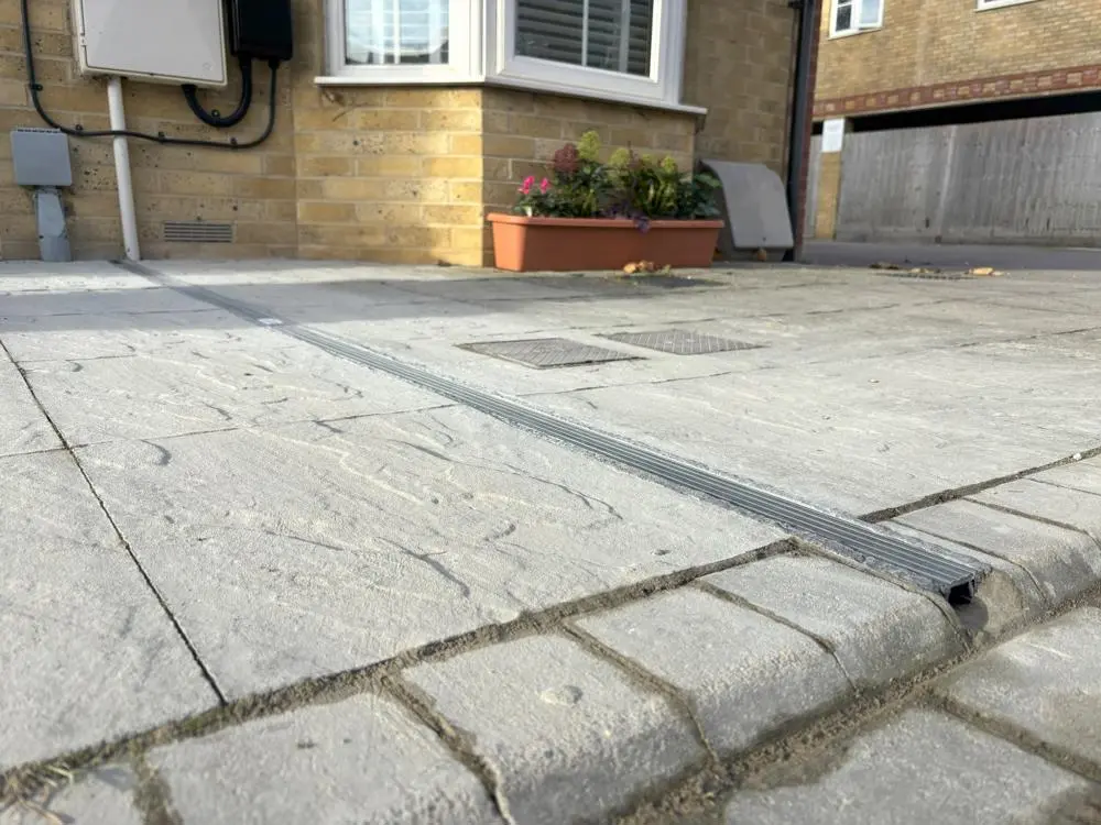 A close-up of a Kerbo Charge installation built into the pavement