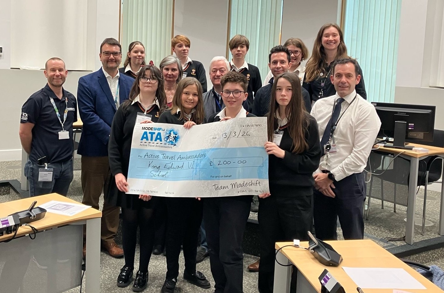 The winning pupils from King Edwards VI school and judges in the council chamber.