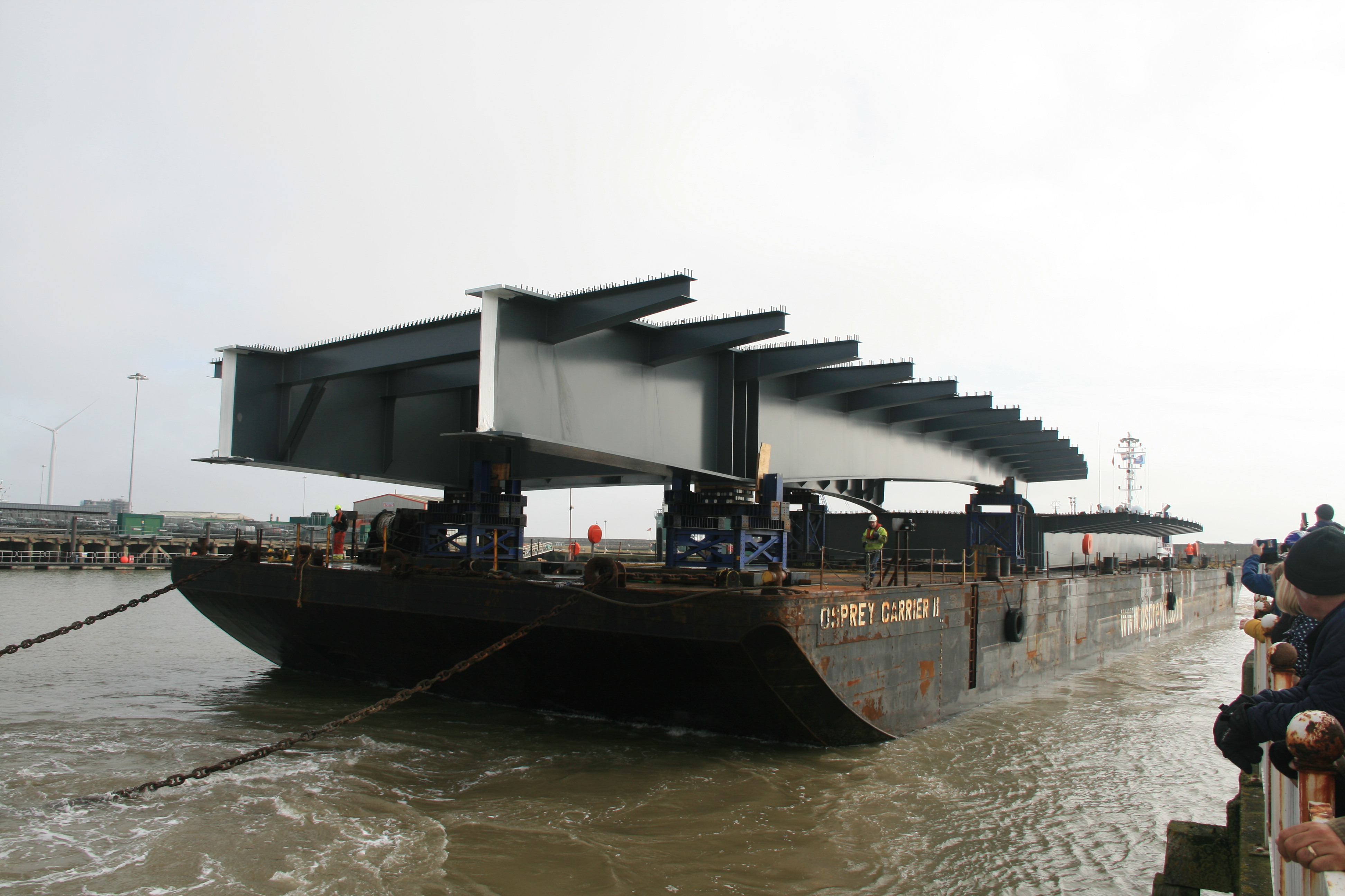 The barge arrives into the inner harbour at Lowestoft.