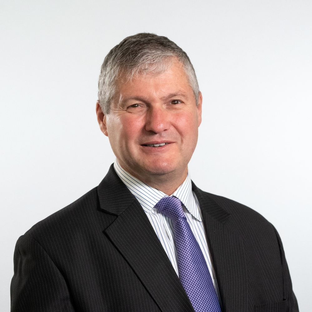 Cllr Paul Reeder wearing suit and tie 
