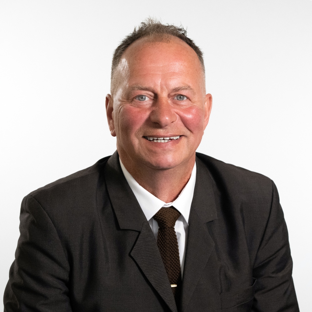 Councillopr Paull Sutton wearing suit and tie