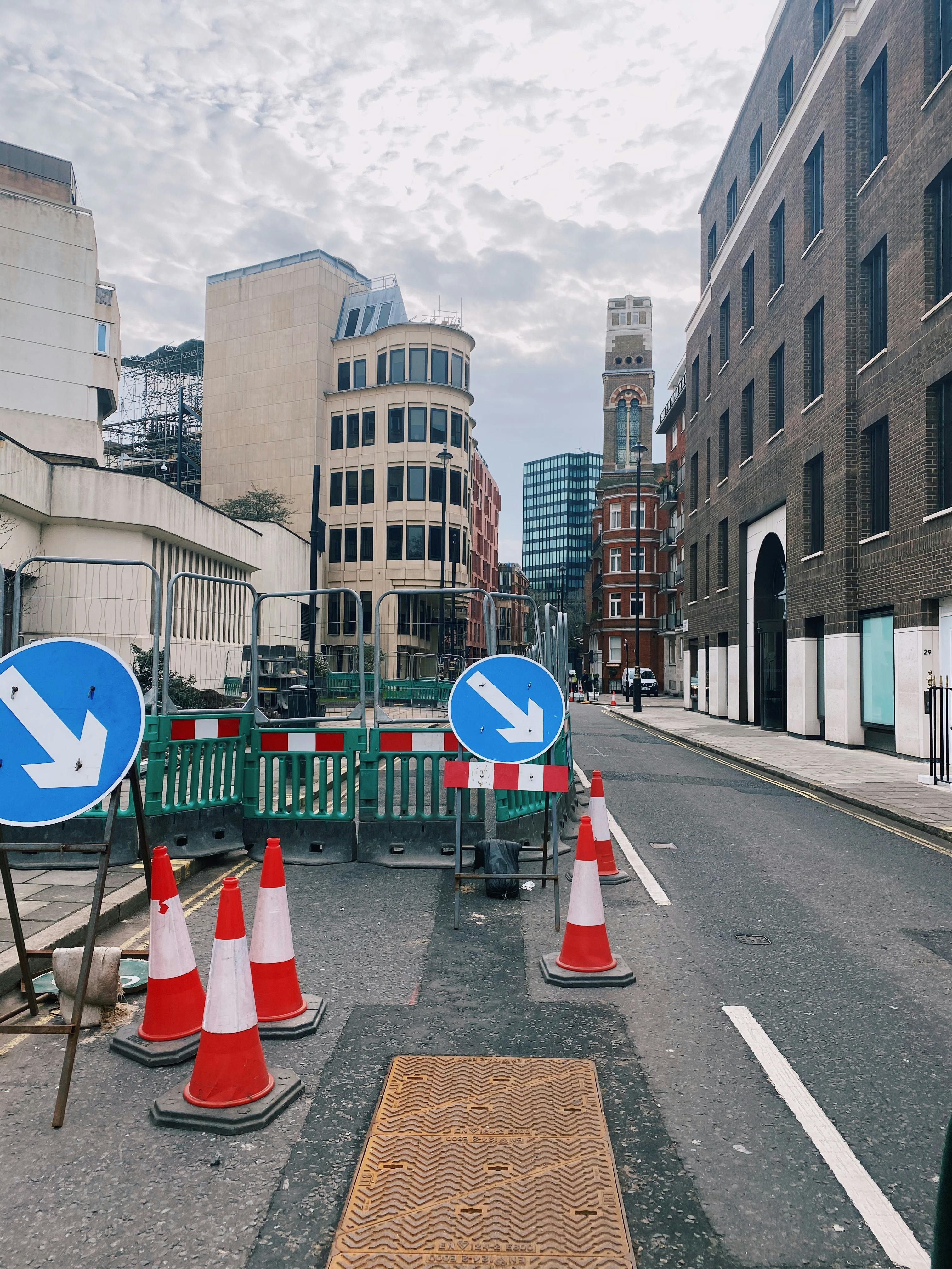 view of a city street with road works signage displayed