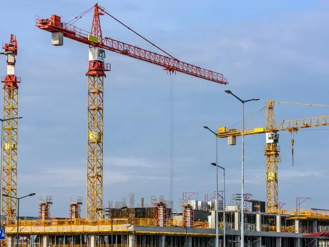 cranes and building site