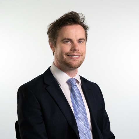 Councillor Philip Faircloth-Muton wearing suit and tie