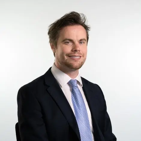 Councillor Philip Faircloth-Mutton wearing black jacket, blue tie and white shirt