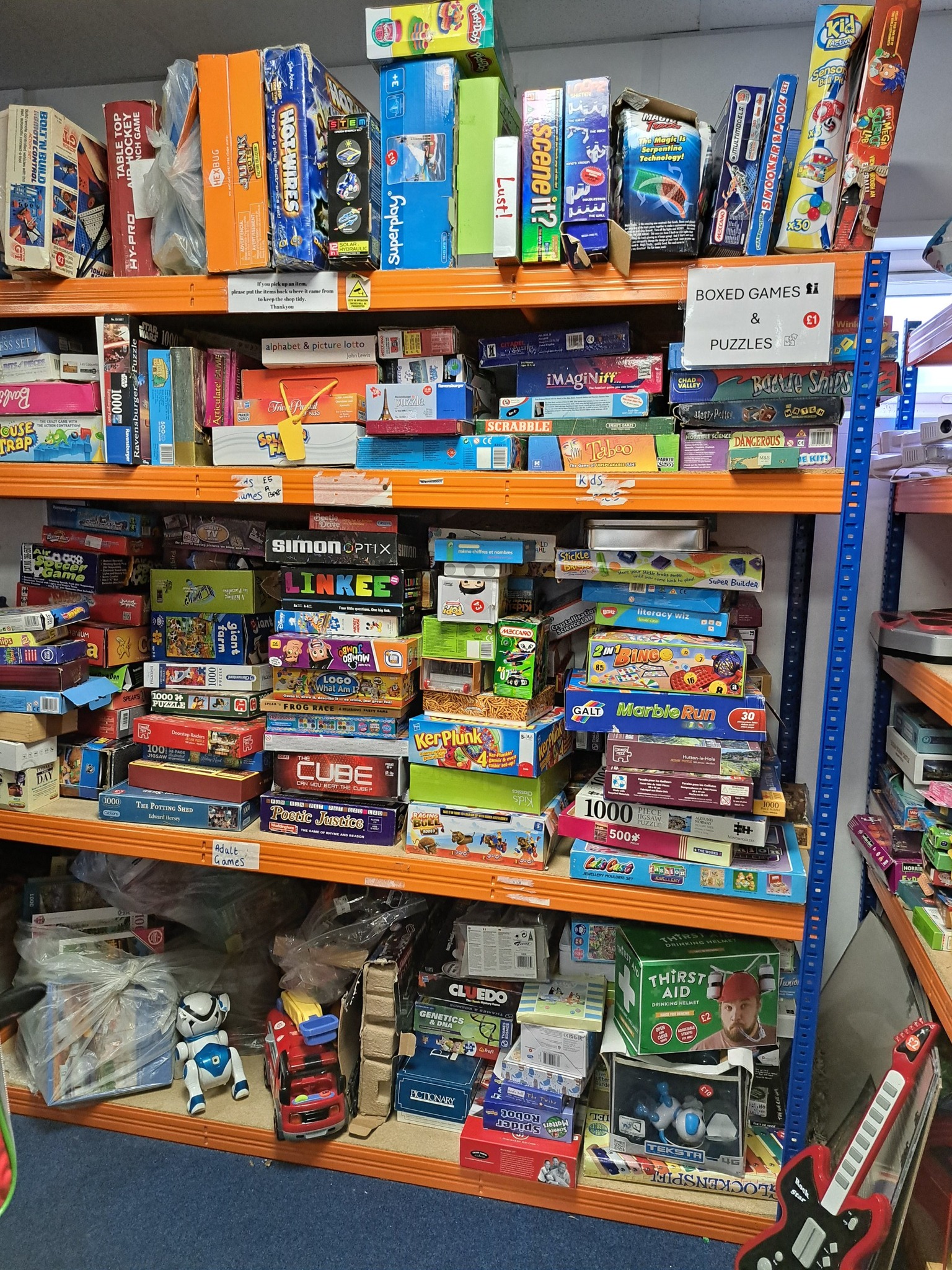 shelves in a shop full of toys and board games