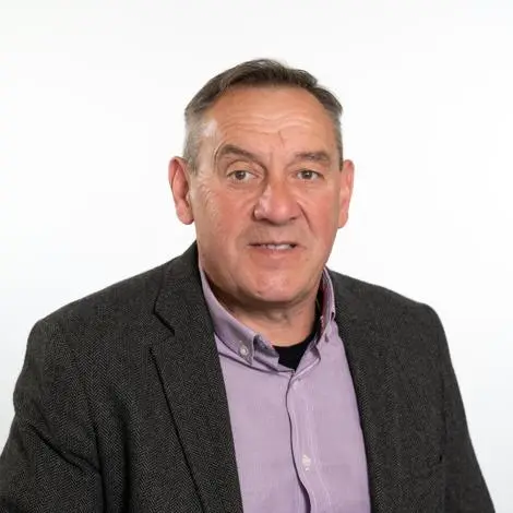 Councillor Richard Read wearing jacket and mauve shirt