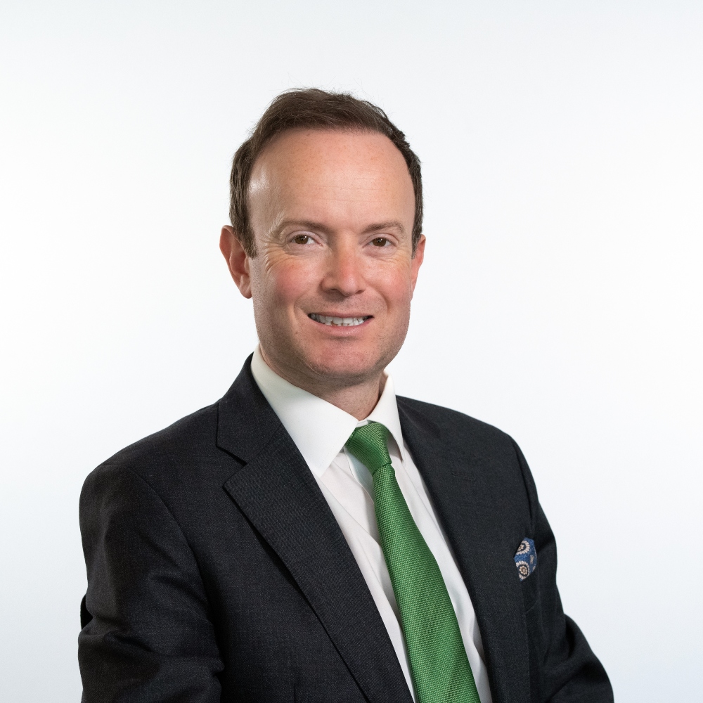 Cllr Richard Rout wearing suit and tie