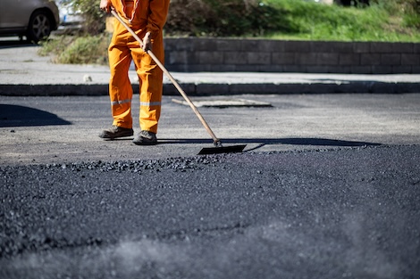 Man repairing road