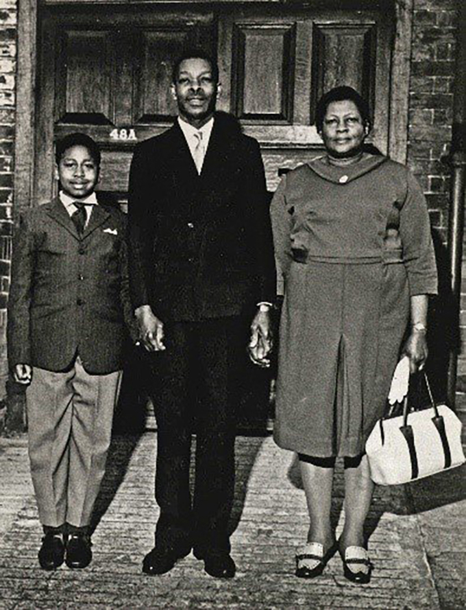 Old black and white photograph of a family portrait of Rosetta Weekes and her family.