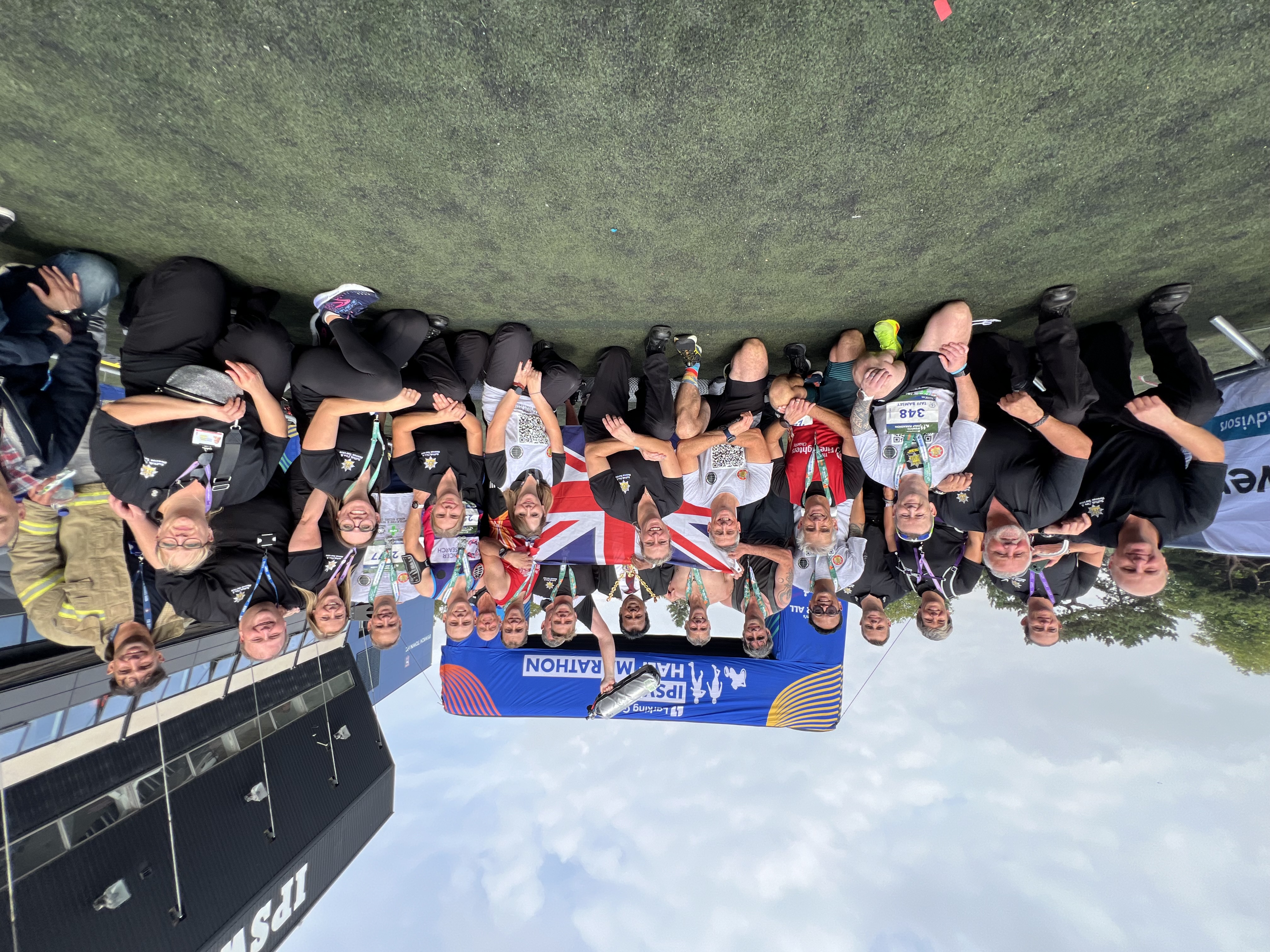 The runners and their support team with the Mayor of Ipswich